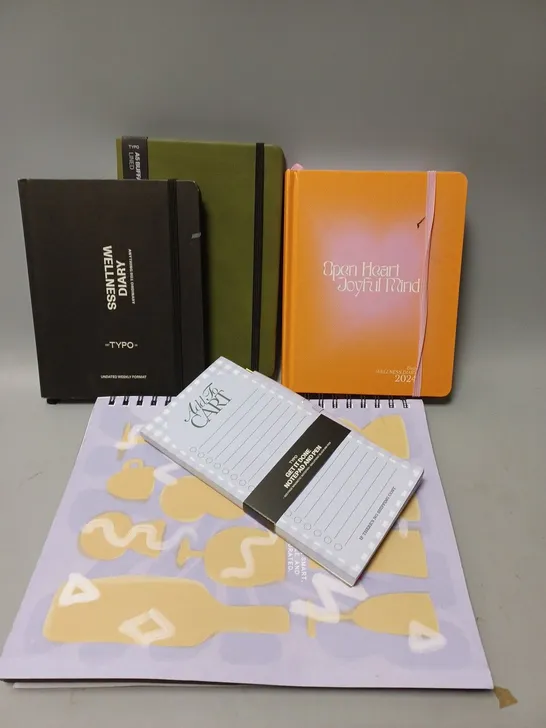 APPROXIMATELY 25 ASSORTED TYPO DIARIES, JOURNALS, NOTEBOOKS TO INCLUDE GARFIELD UNIVERSITY A5 CAMPUS NOTEBOOK, A6 BUFFALO JOURNAL, A4 EVERYDAY NOTEBOOK 