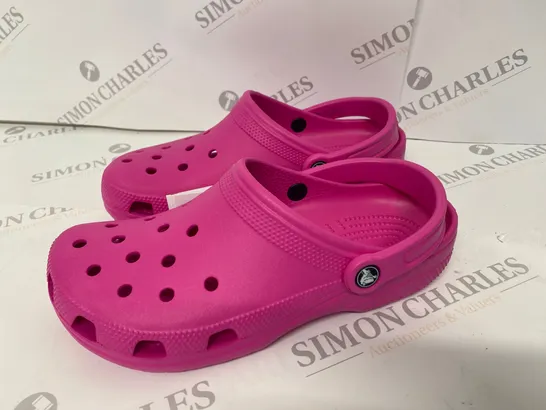 PAIR OF PINK CROCS SIZE M8 W10