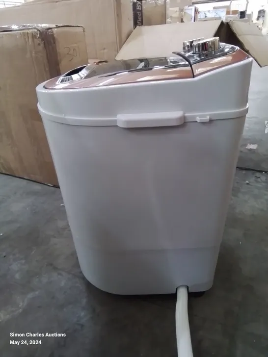 A BOXED COUNTER TOP MINI WASHING MACHINE 