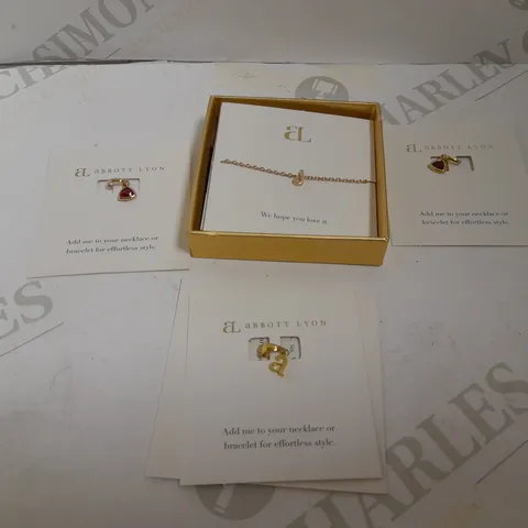 4 ABBOTT LYON ITEMS TO INCLUDE `J` PENDANT, `A` PENDANT AND 2 JULY BIRTH STONES CHARMS