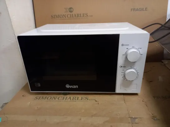 SWAN 700W MANUAL MICROWAVE RRP £108