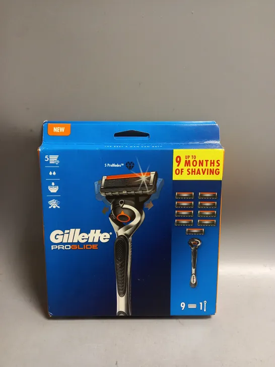 GILLETTE PRO GLIDE RAZOR AND 9 REPLACEMENT CARTRIDGES