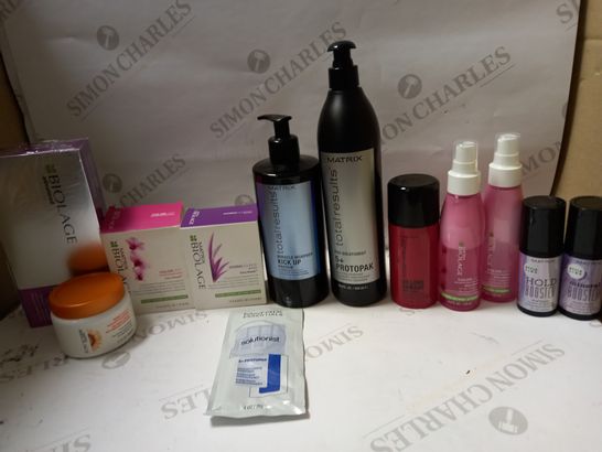 LOT OF APPROX 12 ASSORTED MATRIX HAIRCARE PRODUCTS TO INCLUDE RESTORING TREATMENT, IROM TAMER, SUN REPAIR TREATMENT, ETC