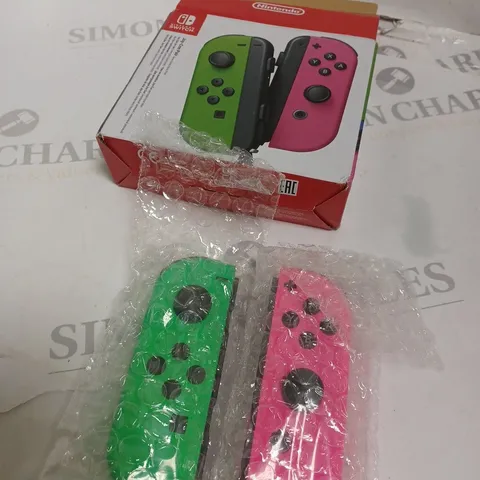 BOXED NINTENDO SWITCH CONTROLLER - GREEN & PINK