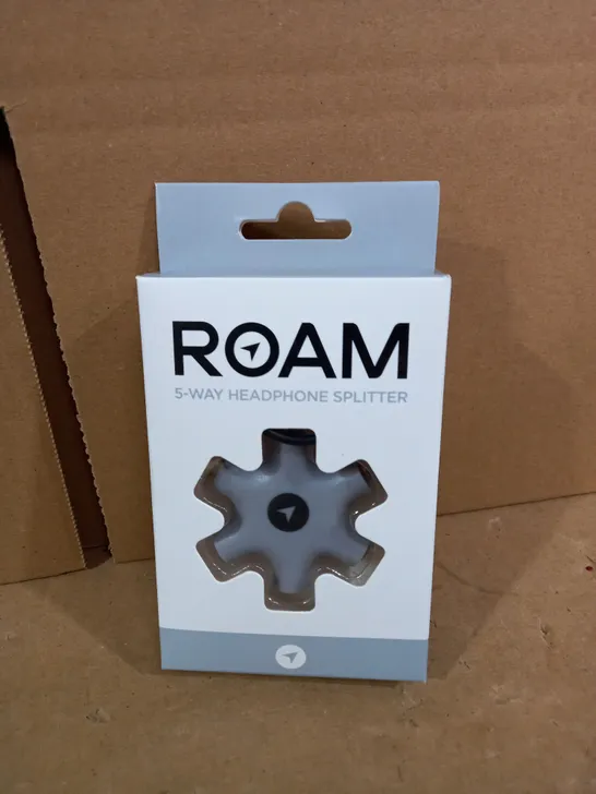 BOX OF APPROXIMATELY 200 BRAND NEW ROAM 5-WAY HEADPHONE SPLITTERS