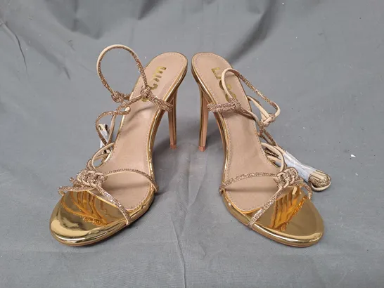 BOXED PAIR OF EGO OPEN TOE STILETTO HEEL STRAPPY SANDALS IN METALLIC GOLD UK SIZE 6