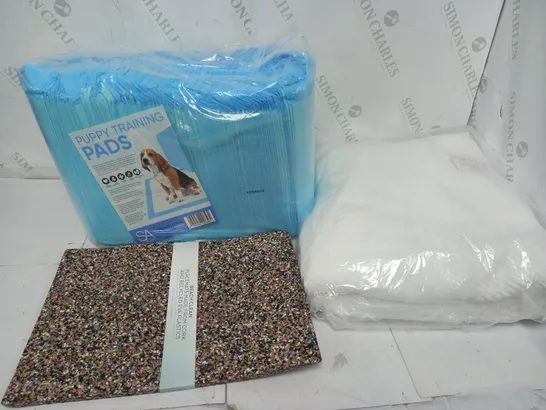 APPROXIMATELY 12 ASSORTED HOUSEHOLD ITEMS TO INCLUDE PUPPY TRAINING PADS, BEACH CLEAN PLACEMENT MATS, ANYWDAY TOWEL IN WHITE, ETC