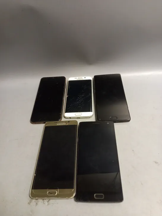 LOT OF 5 DAMAGED MOBILE PHONES 