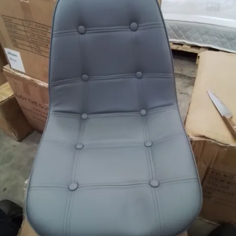 A BOXED DARK GREY BUTTON BACK FAUX LEATHER UPHOLSTERED SWIVEL OFFICE CHAIR