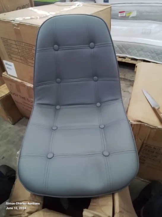 A BOXED DARK GREY BUTTON BACK FAUX LEATHER UPHOLSTERED SWIVEL OFFICE CHAIR