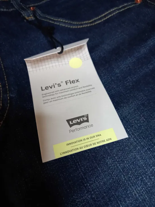 LEVI STRAUSS SLIM TAPER JEANS - SIZE W34/L34