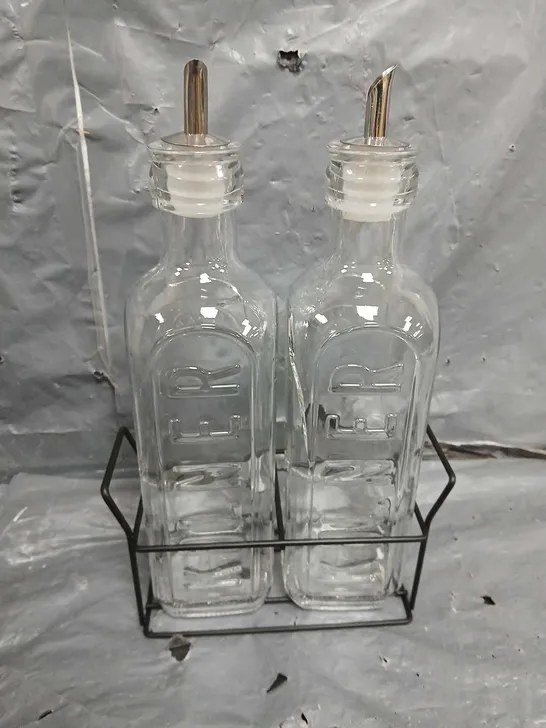 BOXED SET OF 2 GLASS OIL BOTTLES & METAL RACK