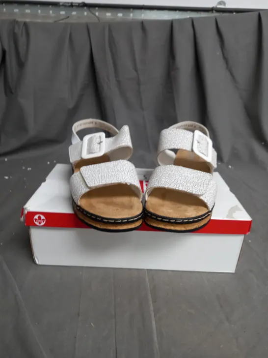 BOXED PAIR OF WEDGE SANDALS IN WHITE SIZE 7