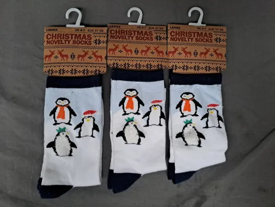 BOX OF APPROXIMATELY 20 PAIRS OF CHRISTMAS NOVELTY PENGUIN SOCKS