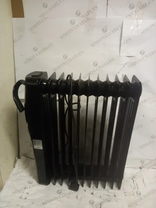 RUSSEL HOBBS BLACK OI8L FILLED RADIATOR 