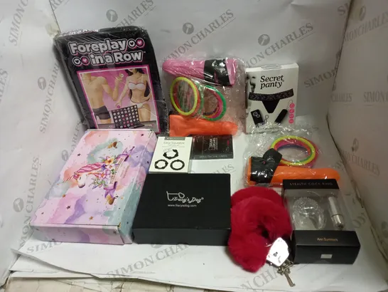 LOT OF APPROX 10 ASSORTED ADULT ITEMS TO INCLUDE DILDOS, COCK RING, FUZZY CUFFS ETC