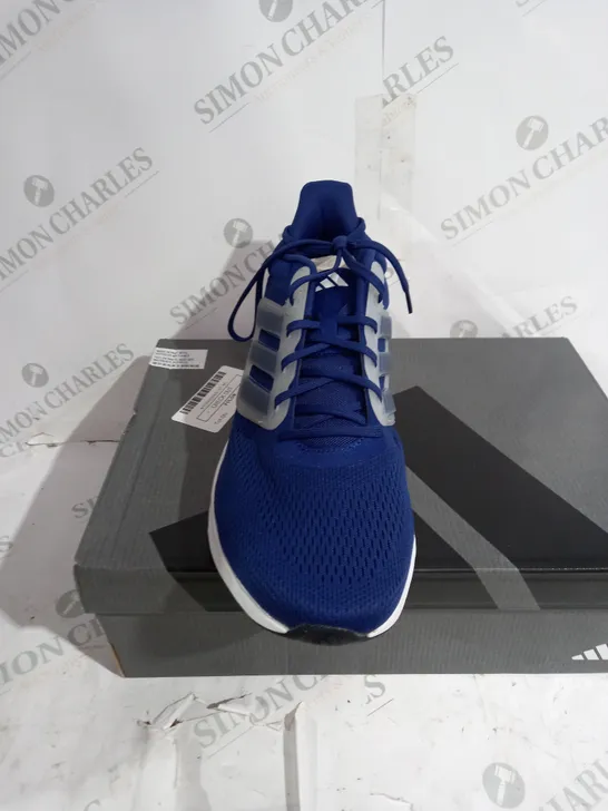 BOXED PAIR OF ULTRABOUNCE HP5774 TRAINERS IN BLUE - SIZE: UK 12.5