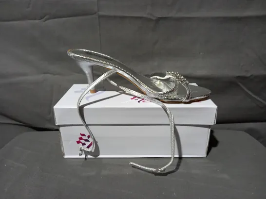 APPROXIMATELY 24 BOXED PAIRS OF LAVANDA STRAP SANDALS IN SILVER VARIOUS SIZES TO INCLUDE SIZES 37, 38, 39