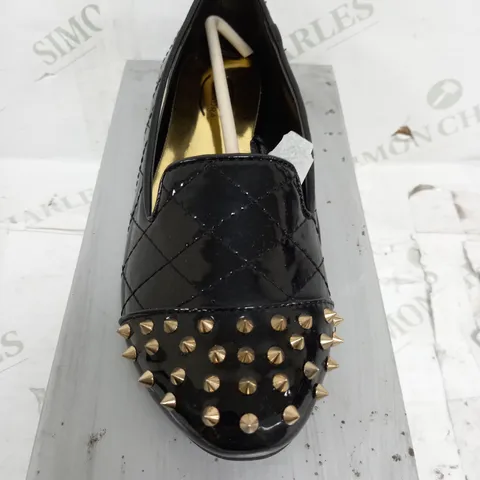 flat heeled spikey black patent shoe size 4