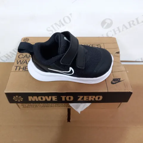 BOXED PAIR OF NIKE BLACK/WHITE TRAINERS SIZE 3.5 TODDLER