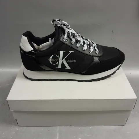 BOXED PAIR OF CALVIN KLEIN CAYLE BLACK FABRIC TRAINERS - 8