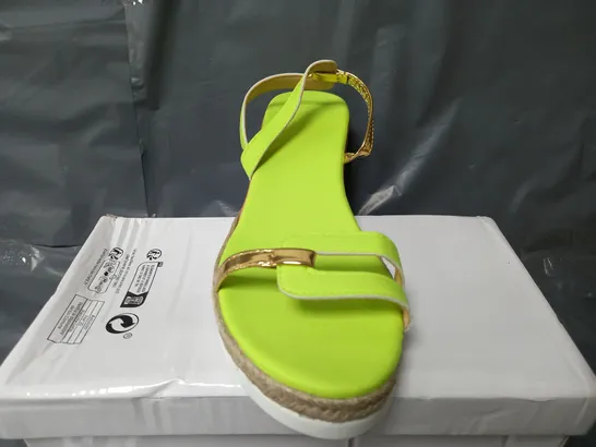 BOXED PAIR OF OPEN TOE RAISED SANDAL SHOES IN LIME GREEN - SIZE 42