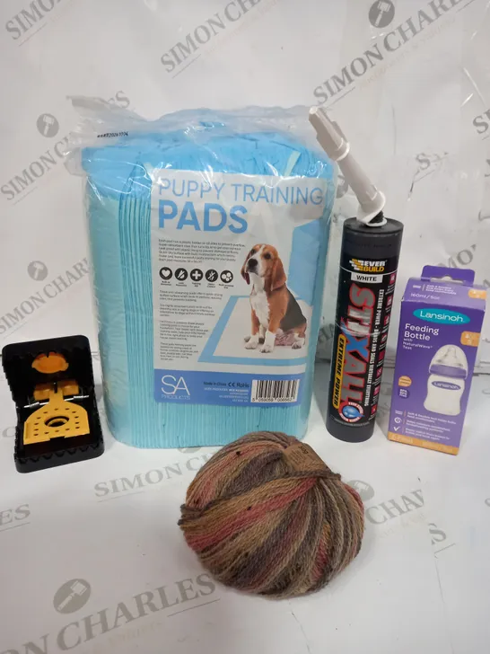 BOX OF APPROXIMATELY 10 ASSORTED ITEMS TO INCLUDE PUPPY TRAINING PADS, FEEDING BOTTLE, MOUSE TRAP ETC