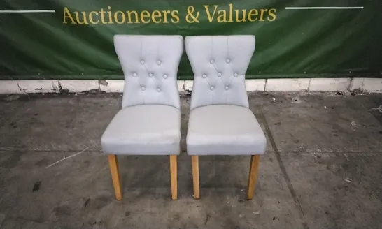 PAIR OF BEWLEY LIGHT GREY LEATHER BUTTON BACK DINING CHAIRS WITH OAK LEGS