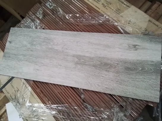 PALLET CONTAINING 74 GREY GLOSS WOOD EFFECT FLOOR TILES EACH 23.5 × 66.2cm (11.5Msq )