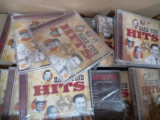 BOX OF APPROXIMATELY 20 HARD TO FIND HITS CDS