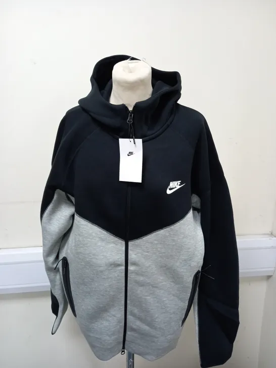 NIKE ZIPPED JACKET SIZE L