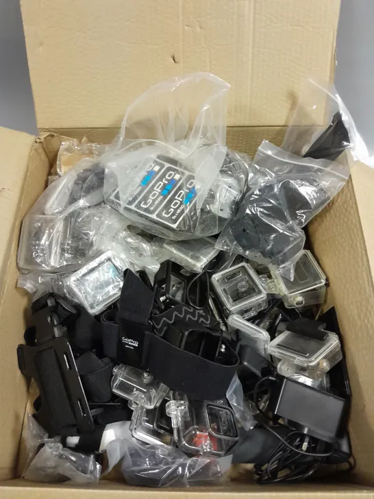 APPROXIMATELY 40 ASSORTED GO-PRO ACCESSORIES TO INCLUDE STRAPS, PROTECTIVE CASES, FLOATS ETC 