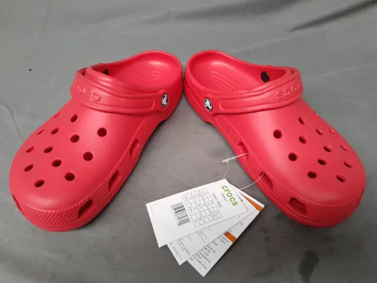 PAIR OF CROCS CLASSICS IN RED UK SIZE M6/W7