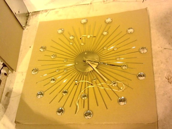KARLSSON SUNBURST WALL CLOCK, SILVER 3126495Simon Charles Auctioneers