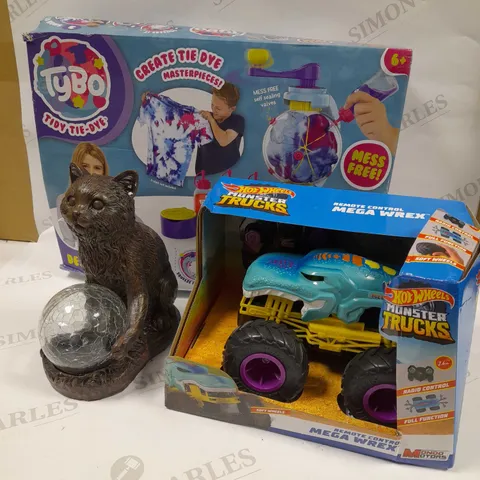 LOT OF 5 ASSORTED HOUSEHOLD ITEMS TO INCLUDE HOT WHEELS MONSTER TRUCKS, TYBO TIE DYE SET. MYSTIC MOG SOLAR FIGURINE, ETC