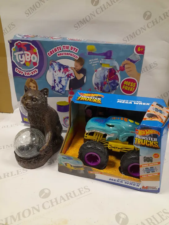 LOT OF 5 ASSORTED HOUSEHOLD ITEMS TO INCLUDE HOT WHEELS MONSTER TRUCKS, TYBO TIE DYE SET. MYSTIC MOG SOLAR FIGURINE, ETC