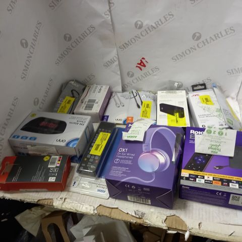 LOT OF APPROXIMATELY 12 ASSORTED ITEMS INCLUDING HEADPHONES , ALARM CLOCKS AND PHONES CHARGERS 
