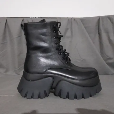 PAIR OF KOI LACE UP BOOTS IN BLACK SIZE 6 