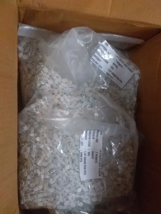 BOX OF APPROXIMATELY 10000 WHITE #3 AUTO LOCK SLIDERS