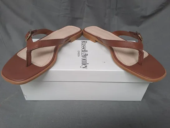 BOXED PAIR OF RUSSELL & BROMLEY FLAT TOE-POST SANDALS IN BROWN EU SIZE 38