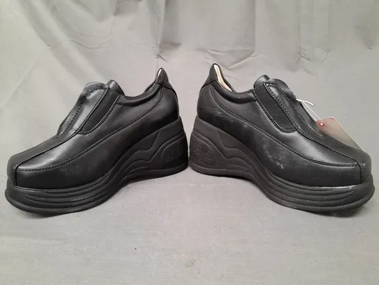 BOXED PAIR OF AUROCHS PLATFORM WEDGE SHOES IN BLACK EU SIZE 36