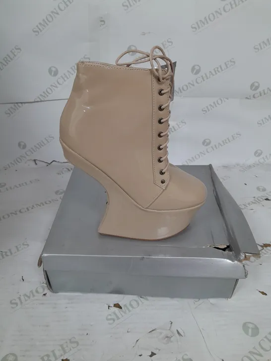 BOXED PAIR OF CASANDRA PLATFORM LACE UP ANKLE BOOT IN NUDE PATENT SIZE 5