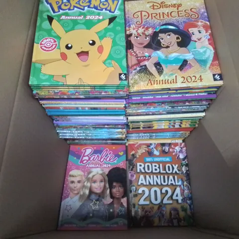 LARGE QUANTITY OF ASSORTED 2024 ANNUALS TO INCLUDE POKEMON, DISNEY PRINCESS, ROBLOX AND BARBIE
