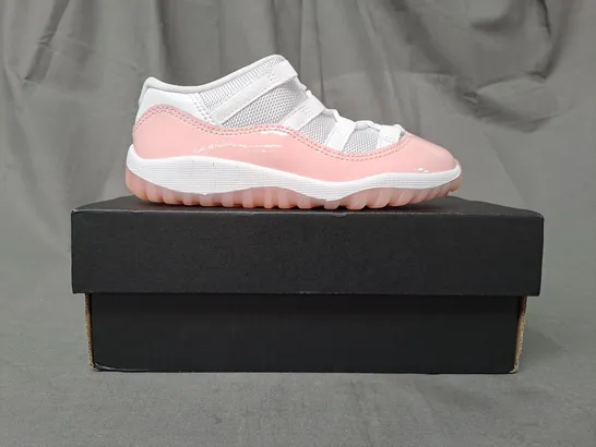 BOXED PAIR OF NIKE JORDAN 11 RETRO LOW KIDS SHOES IN WHITE/PINK UK SIZE 9.5