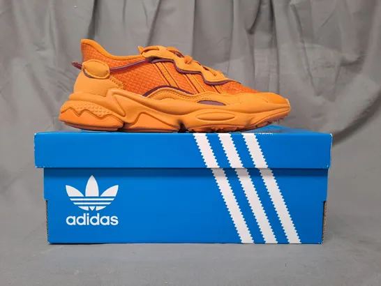 BOXED PAIR OF ADIDAS OZWEEGO SHOES IN ORANGE UK SIZE 6