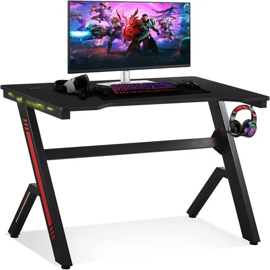 BOXED COMPUTER DESK 110 X 60 CM, ERGONOMIC LARGE GAMING TABLE WITH 7 COLORS LED AND HEADPHONE HOOK CABLE CHANNEL FOR HOME OFFICE, BLACK