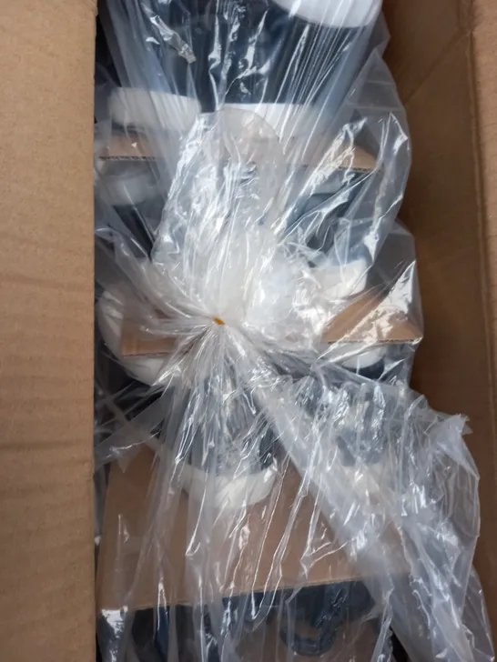 BOX OF APPROXIMATELY 10 PAIRS OF JUNIOR LOW BLACK AND WHITE BOW SHOES 