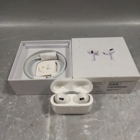 BOXED APPLE AIRPODS PRO WITH WIRELESS CHARGING CASE