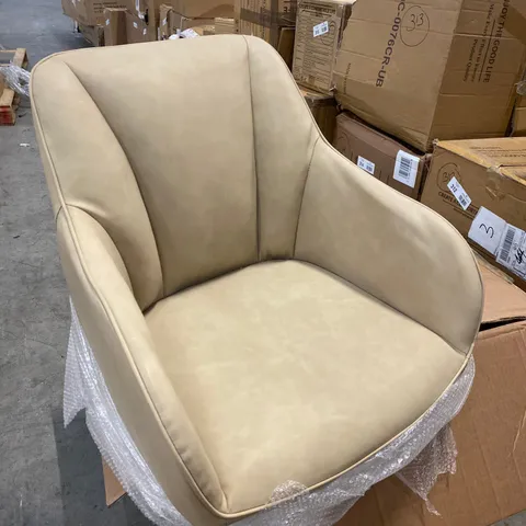 A BOXED PAIR OF CREAM FAUX LEATHER UPHOLSTERED DINING/SIDE CHAIRS