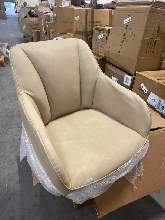 A BOXED PAIR OF CREAM FAUX LEATHER UPHOLSTERED DINING/SIDE CHAIRS